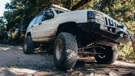 Sportive jeep car in a rural road
