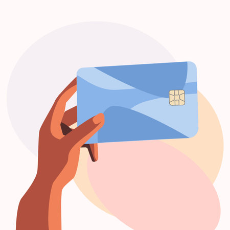 Hand holding a credit card. Vector illustration in flat cartoon style.のイラスト素材