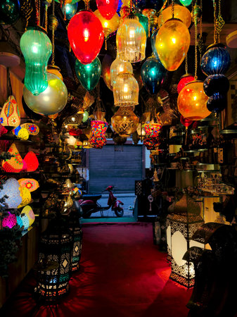 Photo of colorful handcrafted Turkish lamps displayed in a shop. Traditional mosaic and stained...