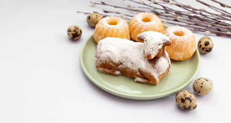 Closeup Easter Sweet Lamb Pound Cake Sprinkled With Powdered Sugar, Quail Eggs, Easter Cupcakes Or...