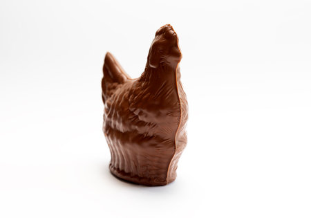 Isolated Chocolate Easter Hen, Sugary Chicken On White Background. Sweet Delicious Candy Gift. Confectionery Concept. Horizontal Plane.の写真素材