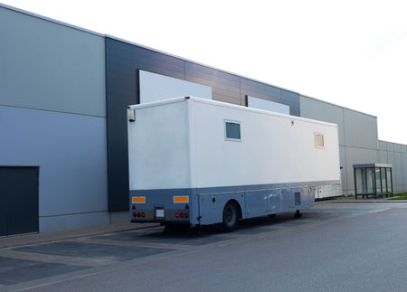 Lab On Wheels, Mobile Medical Center, Laboratory. White Truck, Bus On Parking Near Building. It...