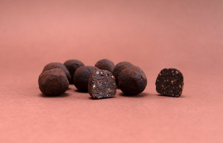 Vegan Raw Sweet Balls made of Organic Cocoa beans With Dry Citrus Fruits on Brown Background. Cop Space. Mockup Horizontal Plane. Healthy Food, Dessertの写真素材