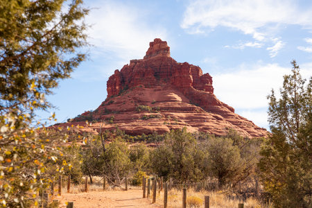 Trail Bell Rock Pathway in Coconino National Forest, Arizona. Rocky and Rough Hill, Mountain. Travel Destination. Sedona, USA Horizontal Plane Sunny Red Mountains with Trees and Sandy Path. Nobodyの写真素材