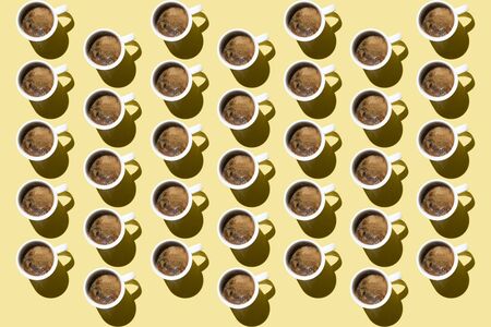 coffee on a yellow background, coffee cups, pattern