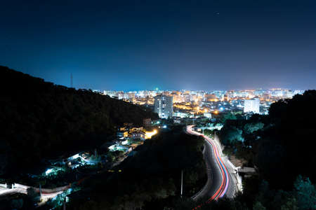 The light trails n the road leading to the Albanian night cityの写真素材