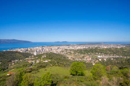 Cityscape seen from Kuzum Baba hill. Aerial city view, city panorama of Vlore city centerの写真素材