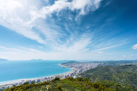 Attractive spring cityscape of Vlore city from Kanines fortress. Captivating morning sescape of Adriatic sea. Spectacular outdoor scene of Albania, Europe. Traveling concept background.の写真素材
