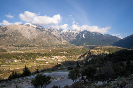Beautiful mountain valley with gentle hills and cloudsの写真素材