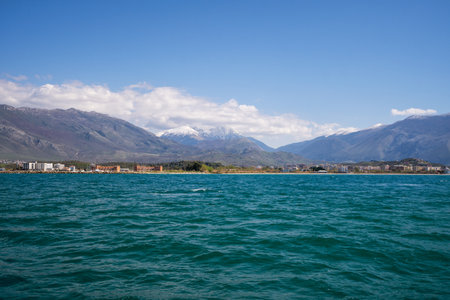 City beach of Vlora resort town, Albania. Summer sunny day. View of the city and the adriatic seaの写真素材