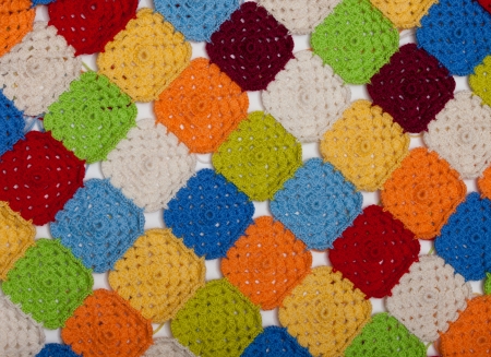 Multicolored plaid squares of crocheted
