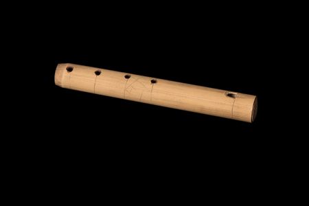 Wooden Flute - isolated on black backgroundの写真素材