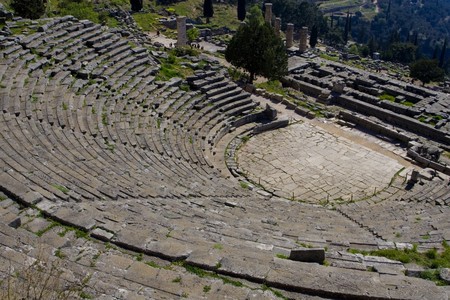 It was originally built in the 4th century B.C. but the ruins we see today date from the Roman Imperial period. The cavea had 35 rows of stone benches; the foundations of the skene are preserved on the paved orchestra. The theatre was used mostly for the の写真素材