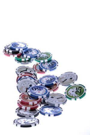 Casino gambling chips on white backgroundの写真素材