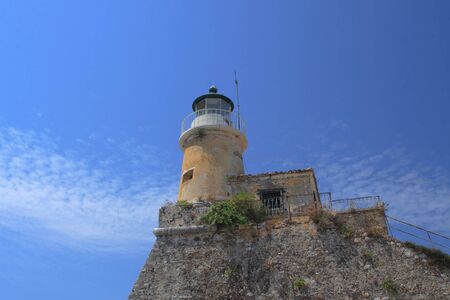 lighthouse in the old castle of Corfu in Greeceの写真素材