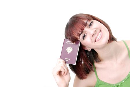 Excited traveler with her passportsの写真素材