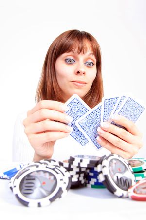 Beautiful Young Woman playing pokerのeditorial素材