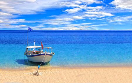 Fishing boat in the Ionian sea in Greeceの写真素材