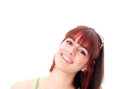 Closeup portrait of a happy young woman smiling isolated on white backgroundの写真素材