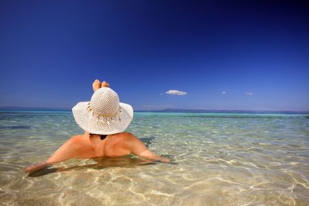 Young beautiful sexy tanned blond woman in bikini in the sea
の写真素材