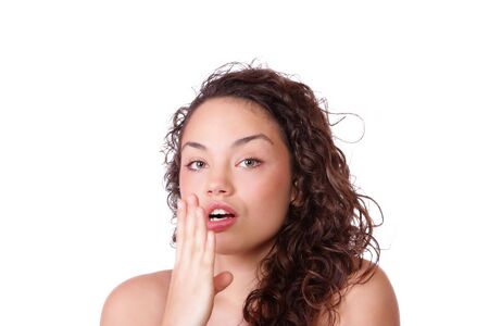 Beautiful young Woman making faces isolated on white background making faces
