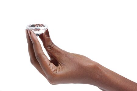 African American Female hand holding diamond over white background
の写真素材
