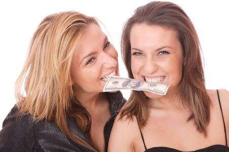 Two casual happy woman with 100 USD billの写真素材