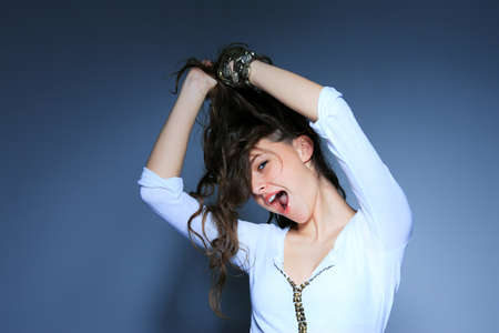 Portrait of glamour woman over blue background