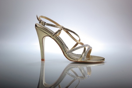 Elegant wedding shoes over gradient gray backgroundの写真素材