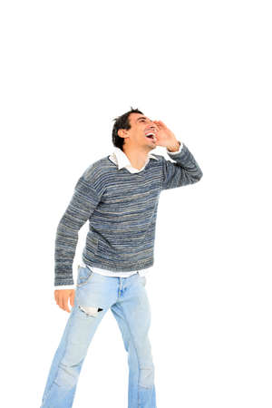 young casual man shouting  isolated on white backgroundの写真素材
