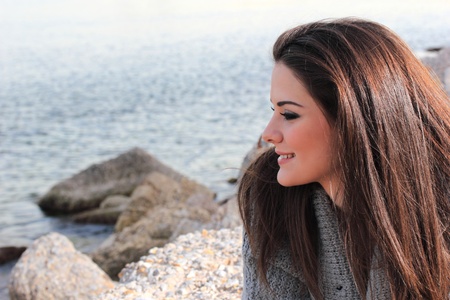 beautiful woman by the sea in Greeceの写真素材