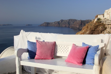 View on caldera and sea from balcony, Santorini, Greeceの写真素材