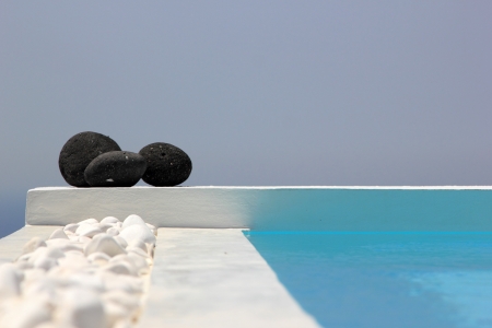Swimming pool with stones setの写真素材