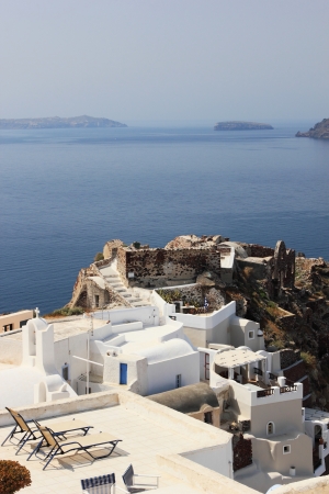 View on caldera and sea from balcony, Santorini, Greeceの写真素材