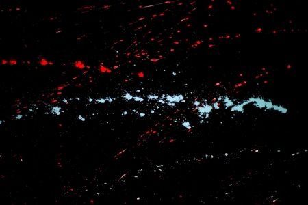 Pint splat design on black wallの写真素材