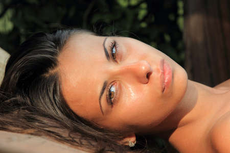 Girl on a tropical beach in the evening