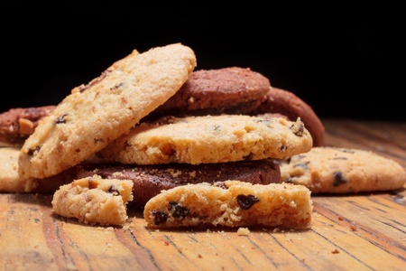 Homemade Chocolate cookies on a wooden plankの写真素材