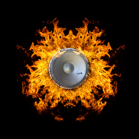 Loudspeaker on Fire Isolated on Black Backgroundの写真素材
