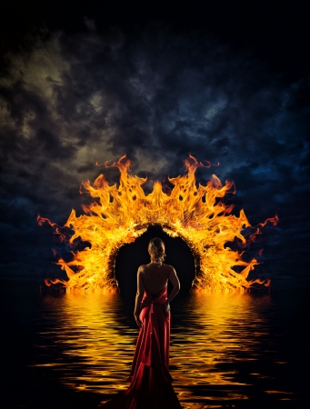 Woman at hell's door dramatic backgroundの写真素材
