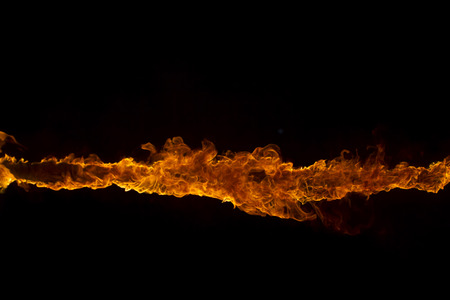 Blazing flames over black background