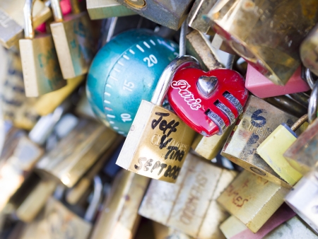PARIS - December 6: Love Padlocks at Pont de l'ArchevÃªchÃ© on December 6, 2013, in Paris. The thousands of locks of loving couples symbolize love forever.のeditorial素材