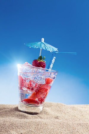 Fresh tropical cocktail on beautiful sunny beachの写真素材