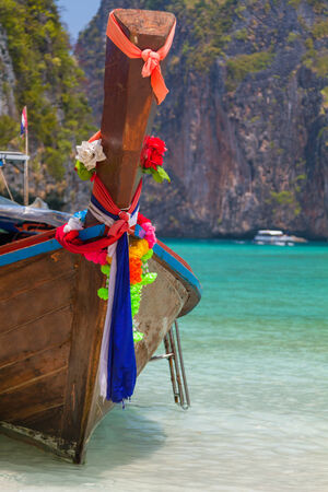 Traditional longtail boat in the famous Maya bay of Phi-phi Leh island, Thailandの写真素材