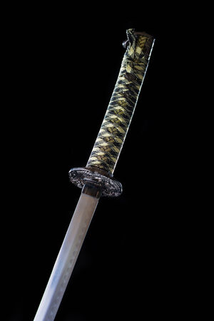 Japanese  katana sword on Dark backgroundの写真素材