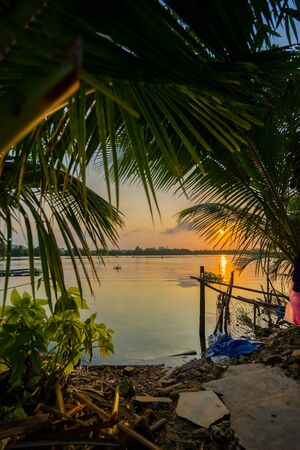 River at Hoi An Vietnam at sunsetの写真素材