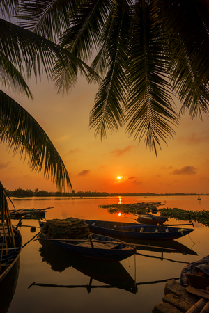 Vinh Cura Dai river in Hoi An Vietnam at sunsetの写真素材