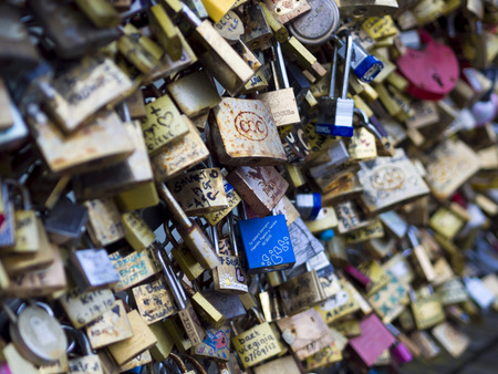PARIS - DEC 6: Love Padlocks at Pont de l'Archevche on December 6, 2013, in Paris. The thousands of...