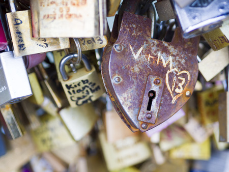 PARIS - DEC 6: Love Padlocks at Pont de l'Archevche on December 6, 2013, in Paris. The thousands of locks of loving couples symbolize love forever.のeditorial素材