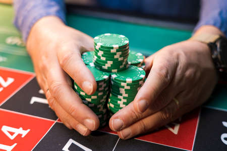 Man playing roulette at the casino - Shallow depth of fieldの写真素材