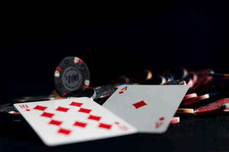 Poker game at the casino gambling table